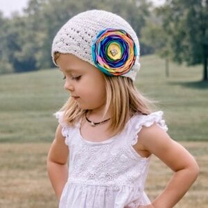 White Crochet Baby Hat With Multicolor Satin Flower‎ Appliqué